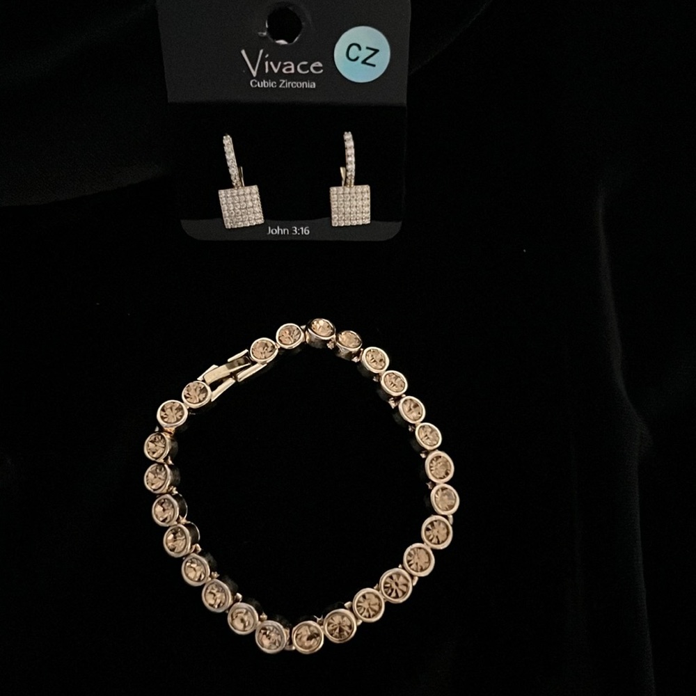 Bundle of gold tone earrings and bracelet with rose gold rhinestones only $10